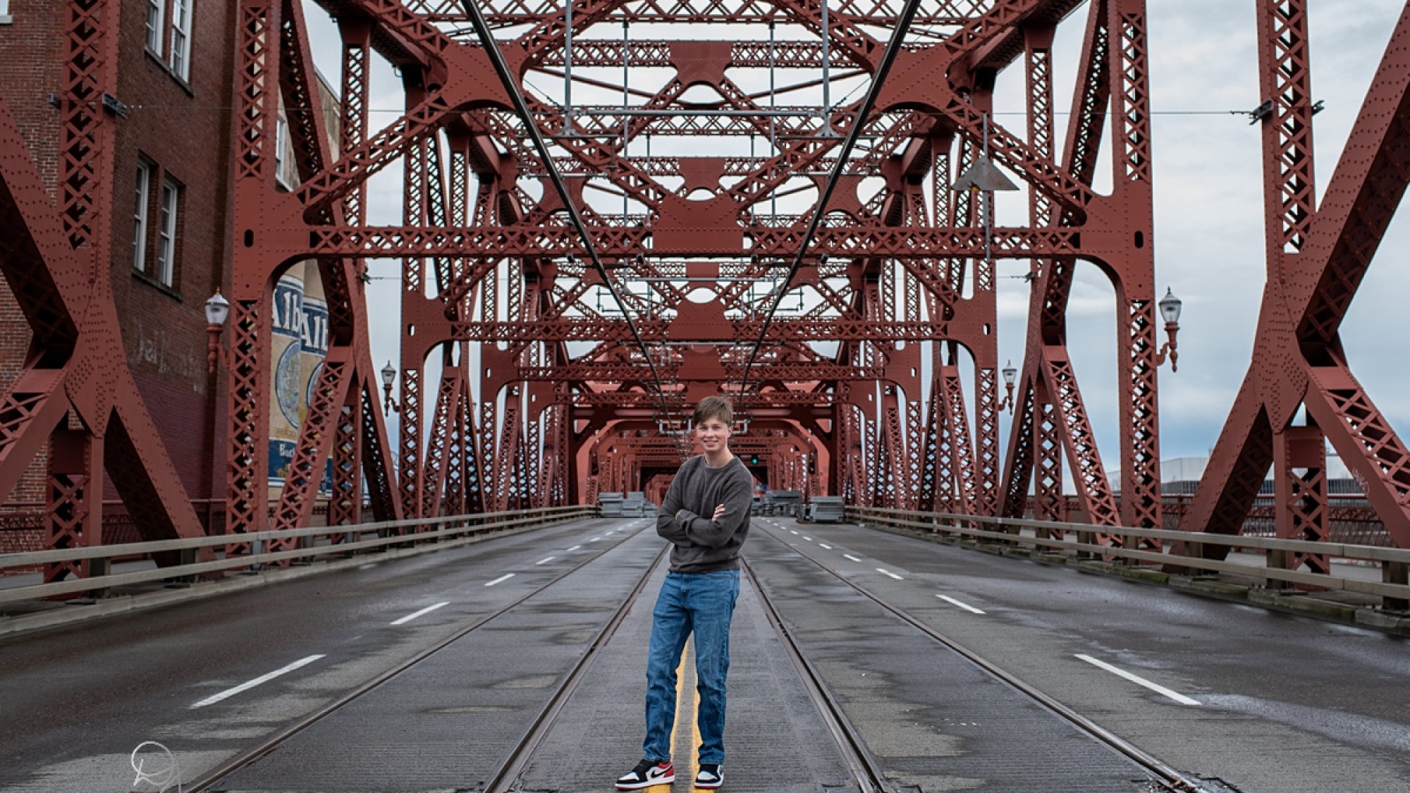 Portland senior pictures — standing in empty bridge roadway downtown Portland